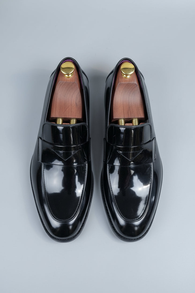 Black patent leather tuxedo shoes with elegant design, perfect for formal events.