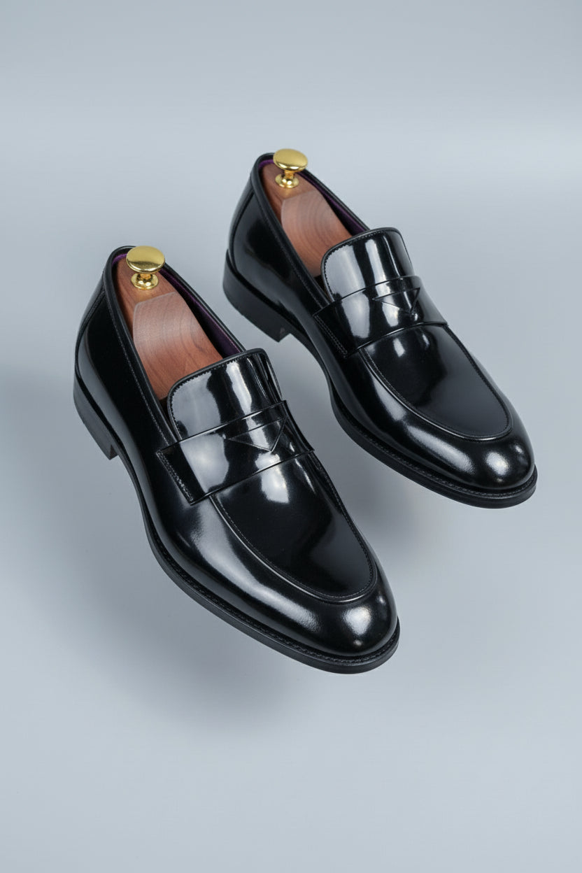 Black patent leather tuxedo shoes with sleek design, perfect for formal events.