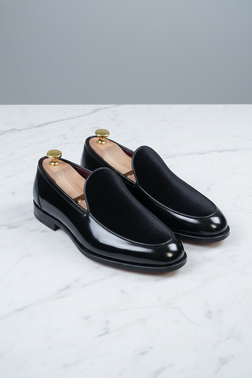 Black velvet slip-on tuxedo shoes with elegant design, perfect for formal wear events.