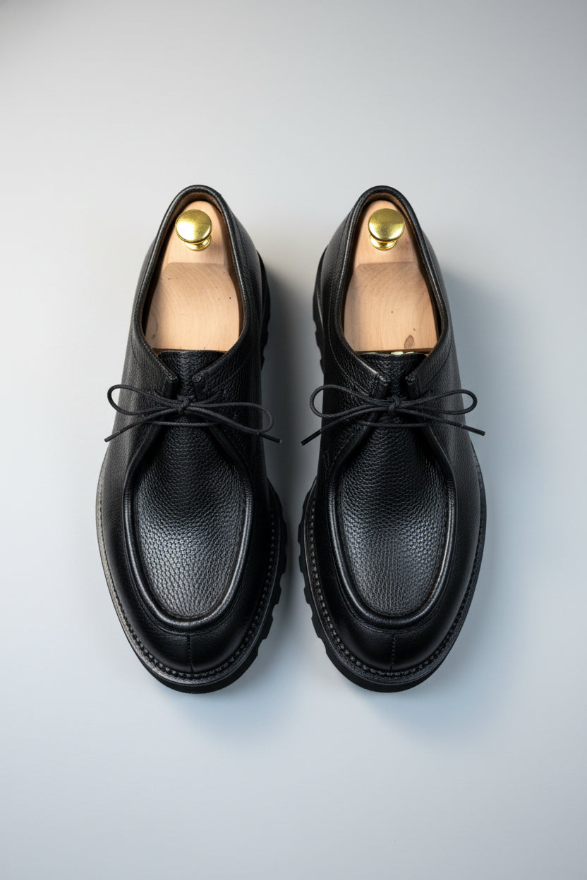 Black leather lace-up shoes with rubber sole for smart-casual weekend wear.