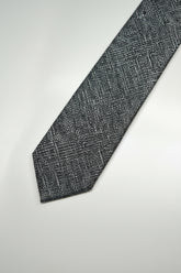Navy textured silk tie with a slim fit, perfect for formal wear and weddings.
