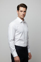 Man wearing classic white slim-fit dress shirt with button-down collar.