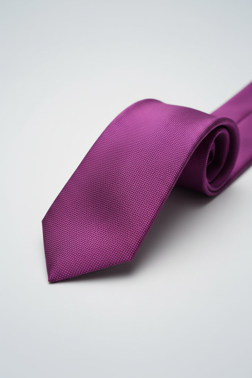 Purple textured silk tie, ideal for formal wear and special events.
