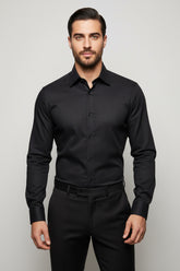 Man wearing black striped slim fit dress shirt, perfect for formal and business casual events.