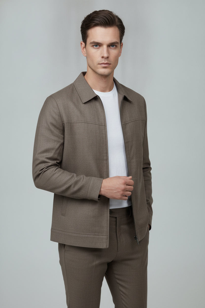 Man wearing taupe zip-front safari suit with classic collar - Suit Sartoria UAE