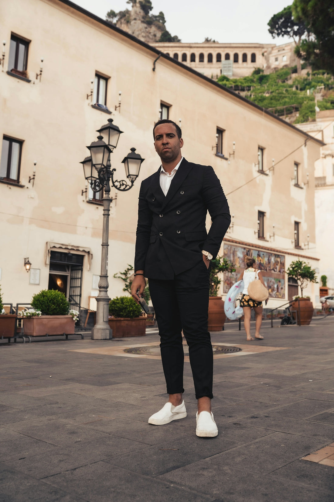 man wearing black suit-jacket