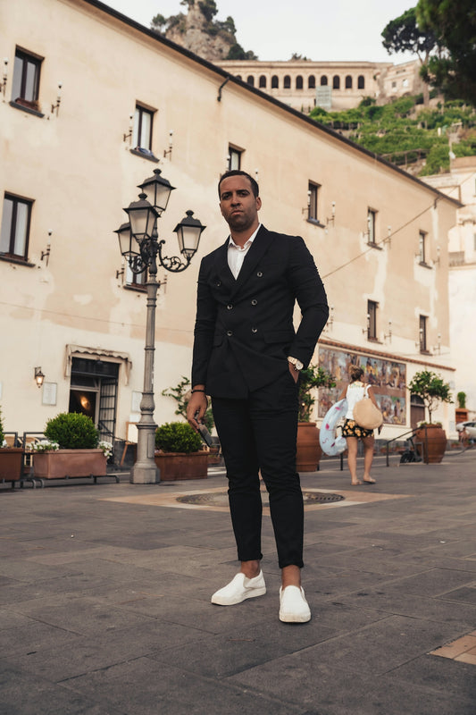 man wearing black suit-jacket