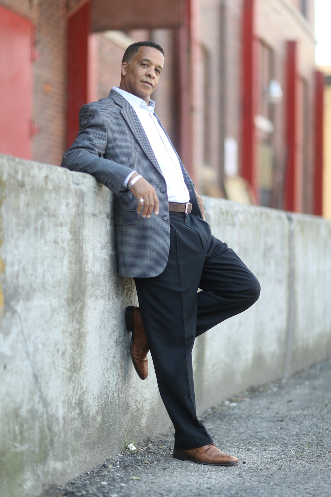 man in black suit jacket and black dress pants