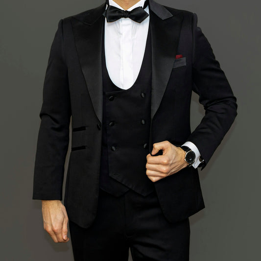 man in black suit jacket and black dress pants