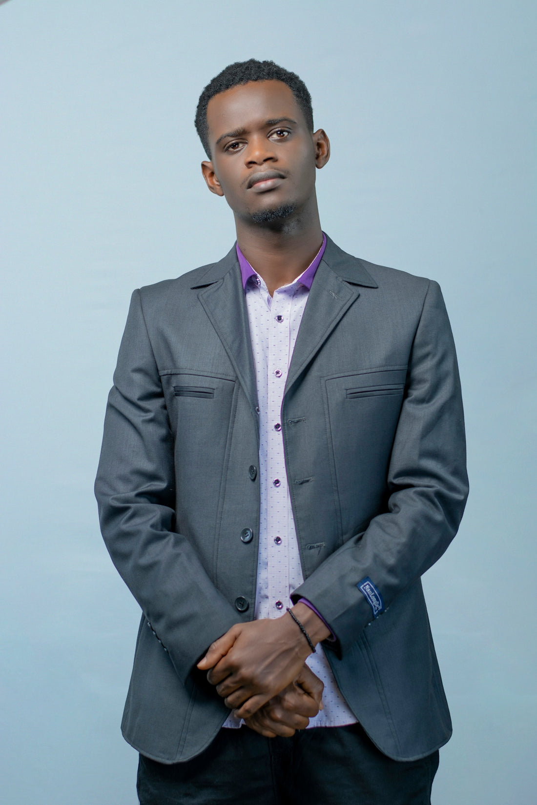 man in gray suit jacket