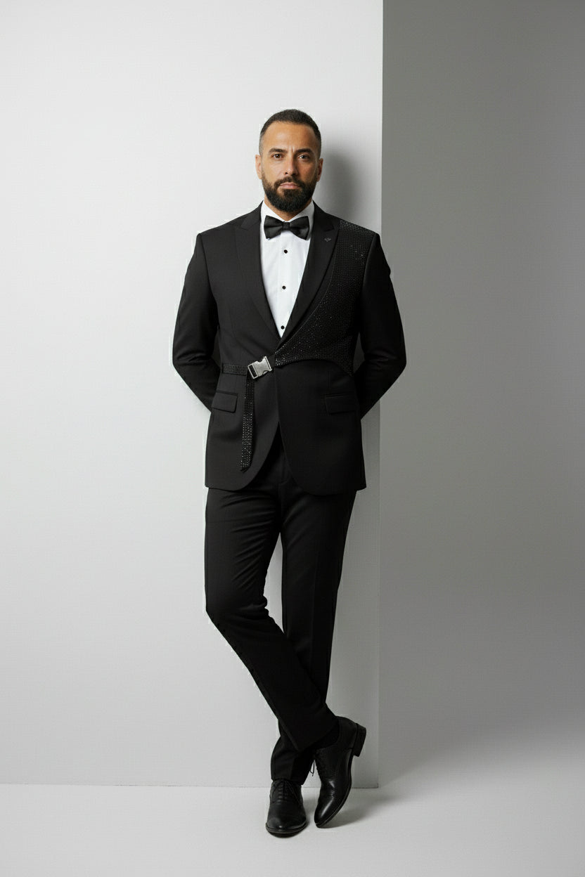 Man in black slim fit suit with sequin detail, perfect for formal events.
