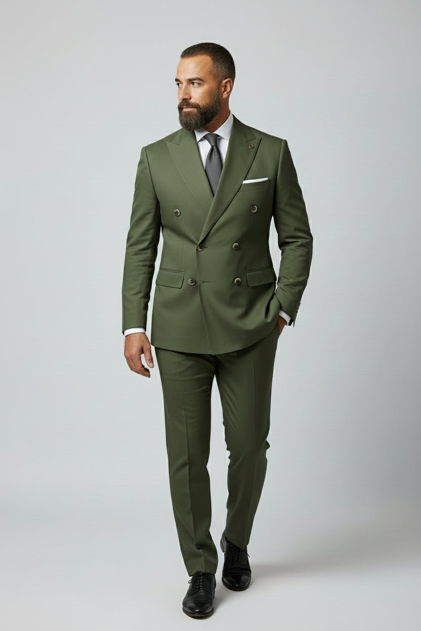 Man in olive double-breasted suit with peak lapels and tailored fit.