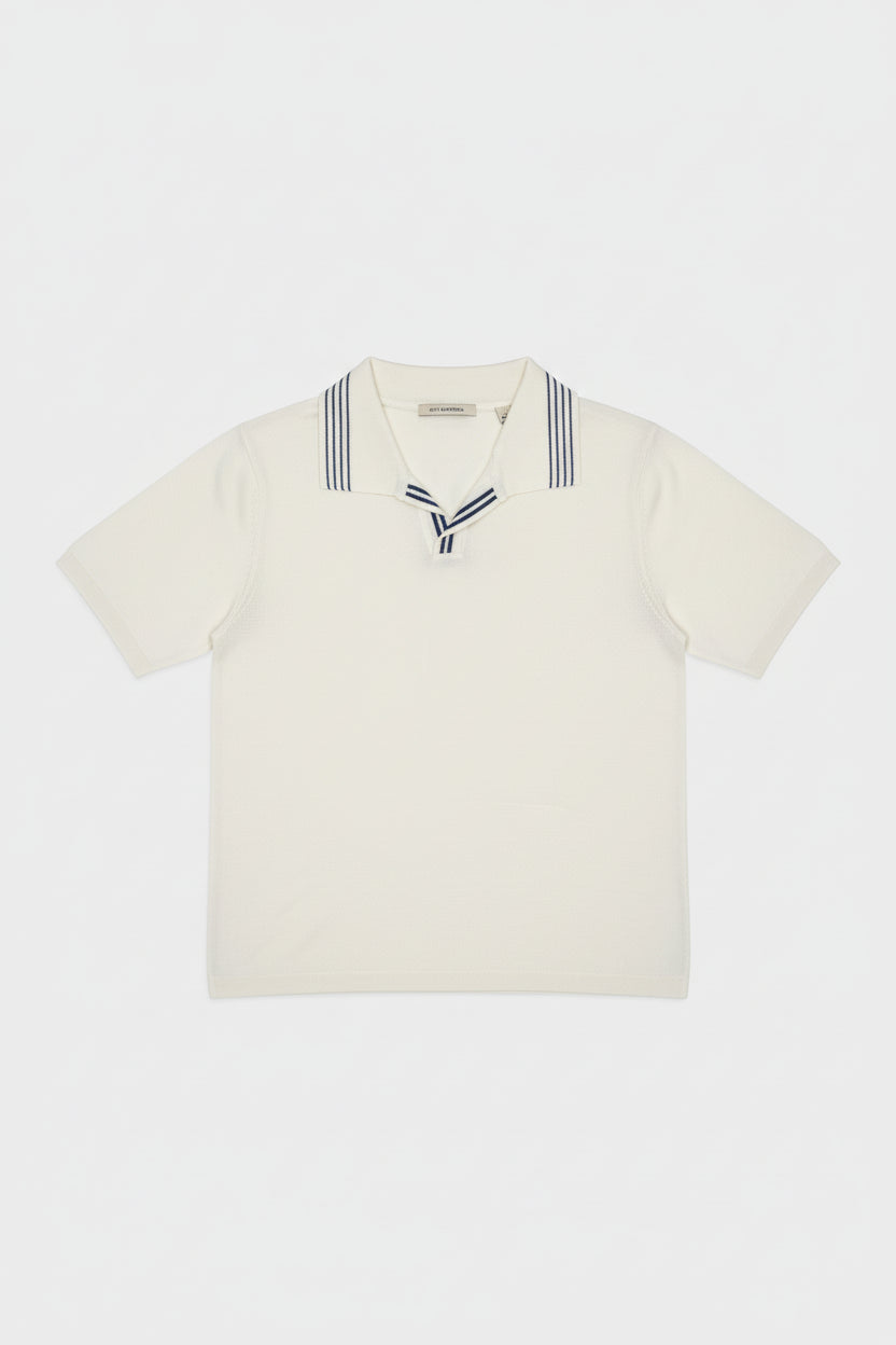 White cotton polo shirt featuring navy stripes on the collar, tailored fit.
