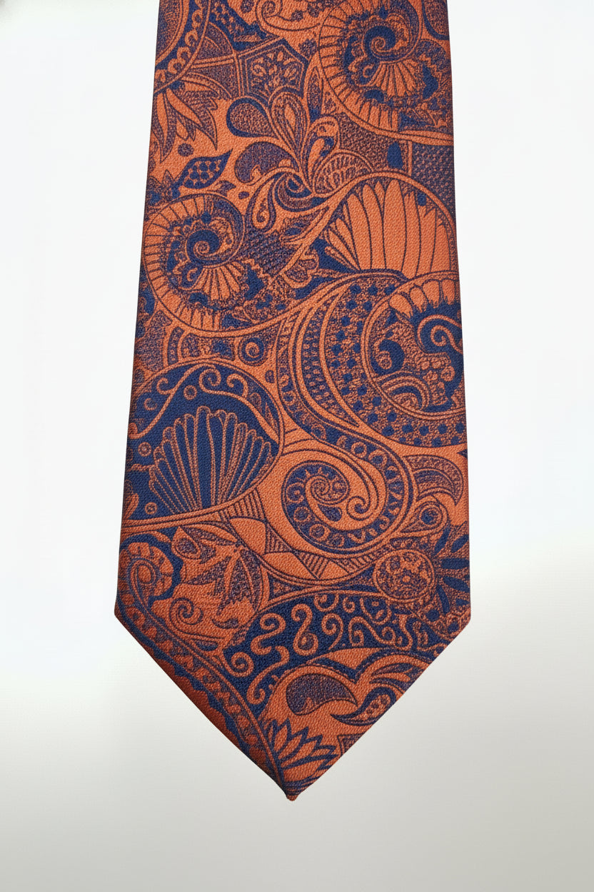 Orange paisley pattern silk tie, perfect for formal wear and evening events.
