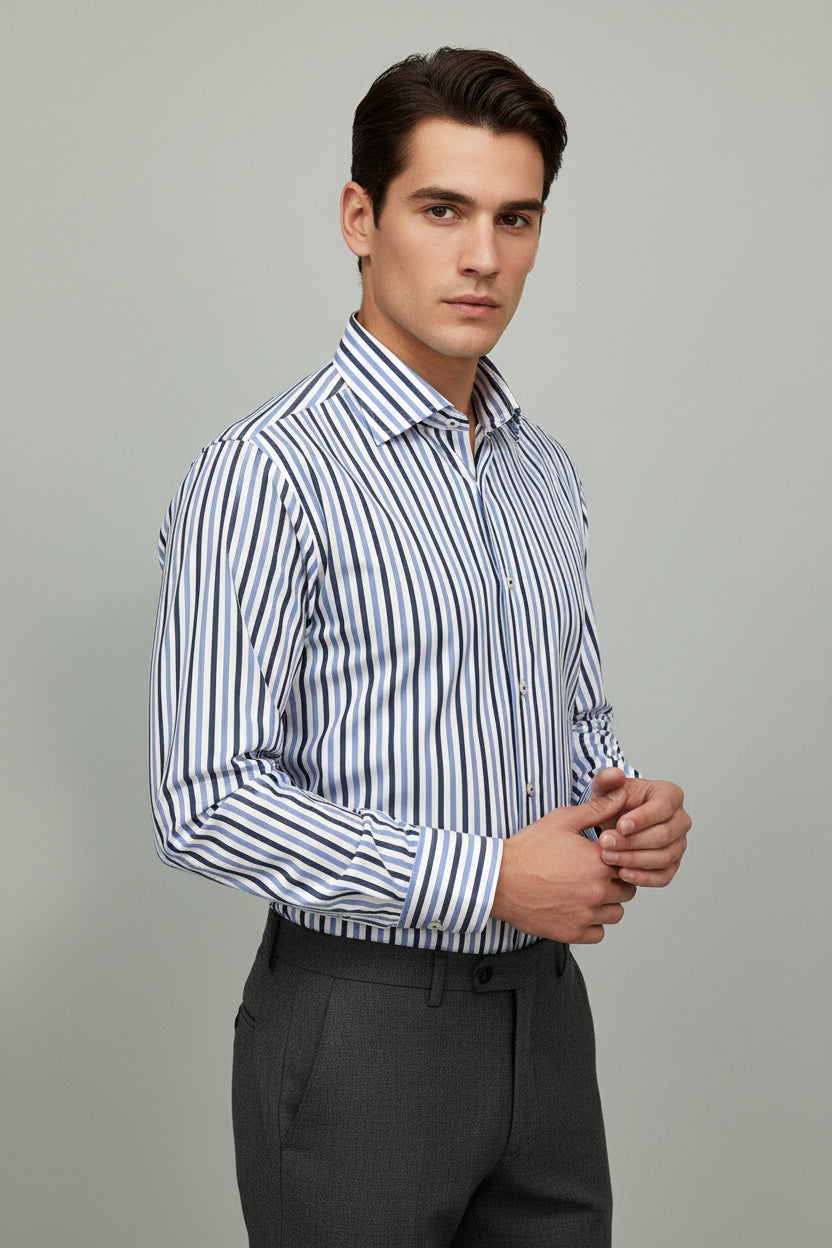 Man wearing blue striped slim fit dress shirt in cotton fabric, ideal for office attire.