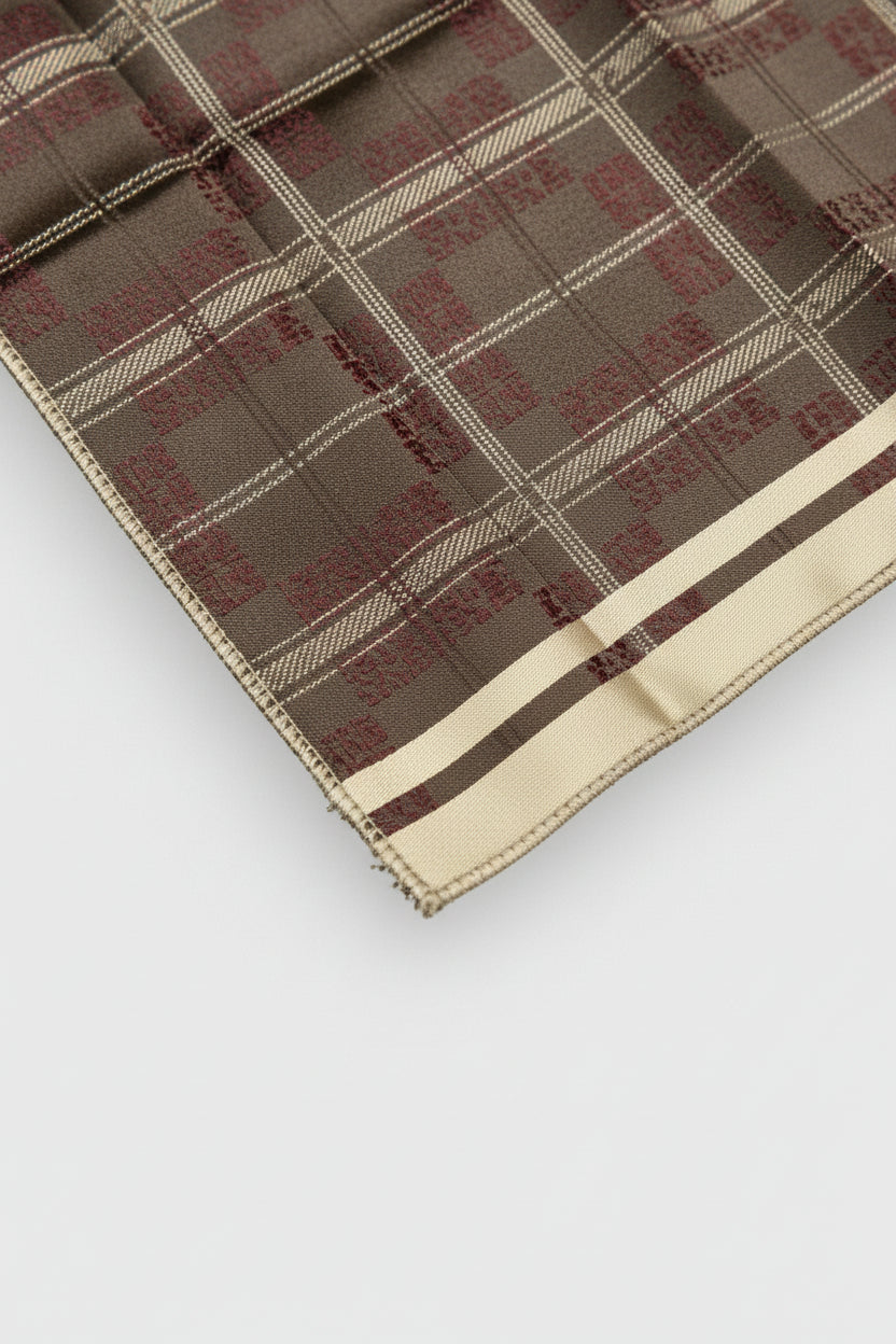 Brown pocket square featuring a plaid design, ideal for formal wear and business attire.