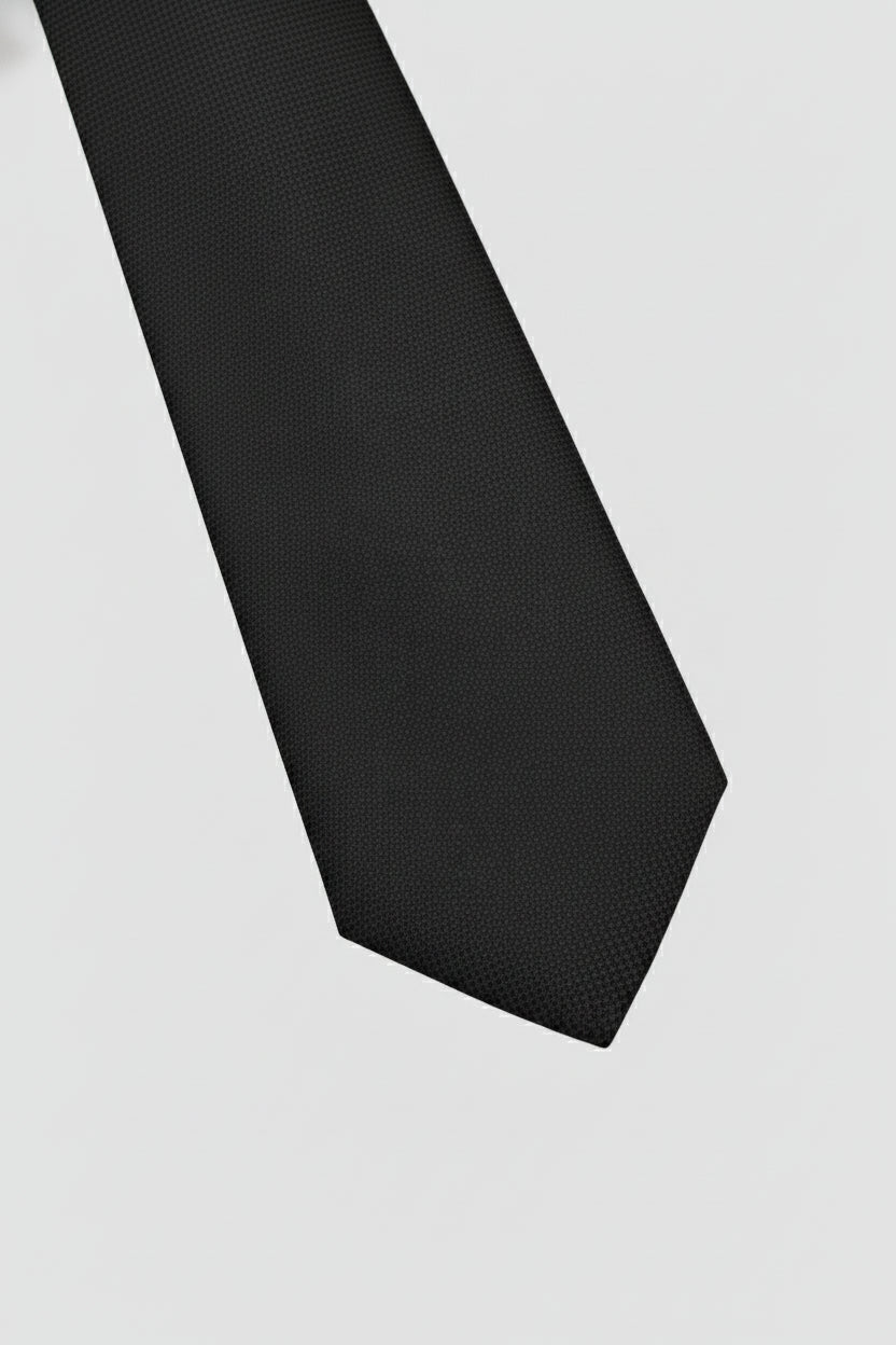 Navy textured silk tie perfect for formal wear and business occasions.