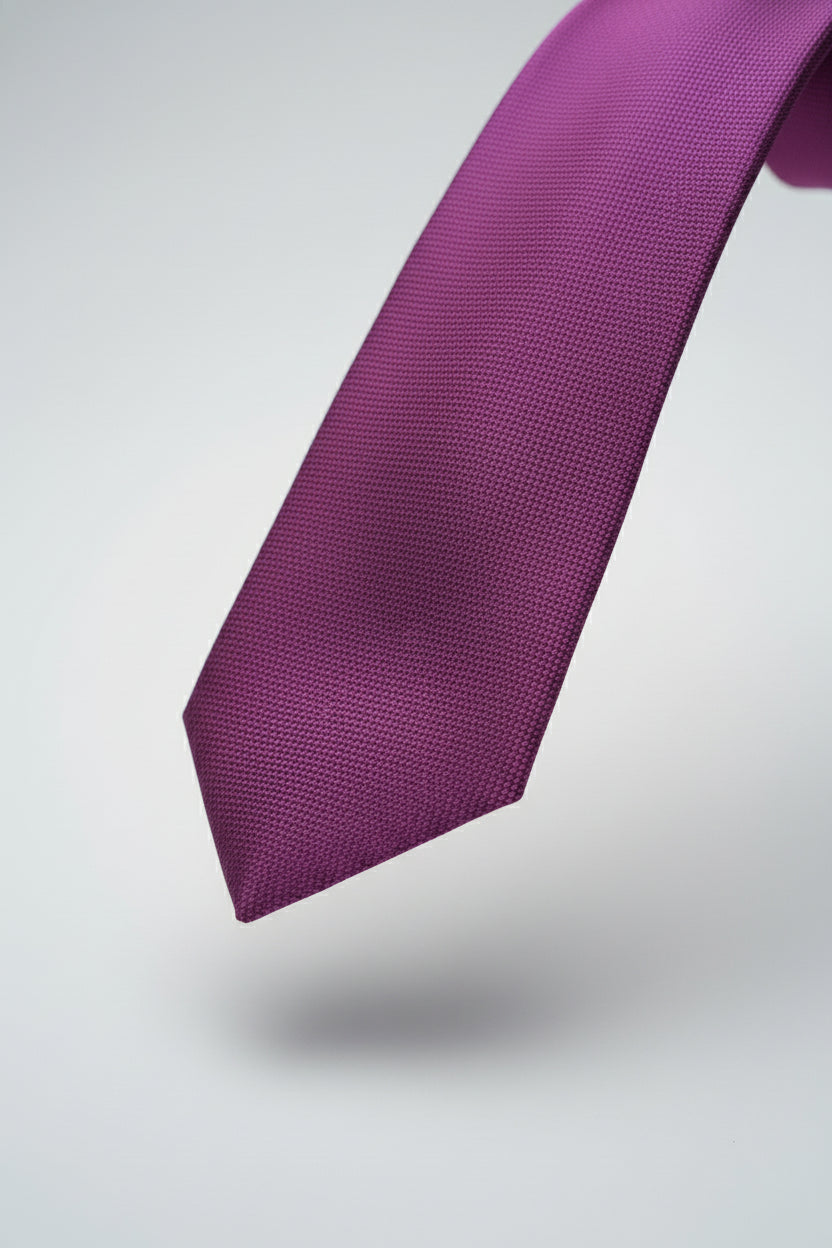 Purple textured silk tie perfect for formal wear and special events.