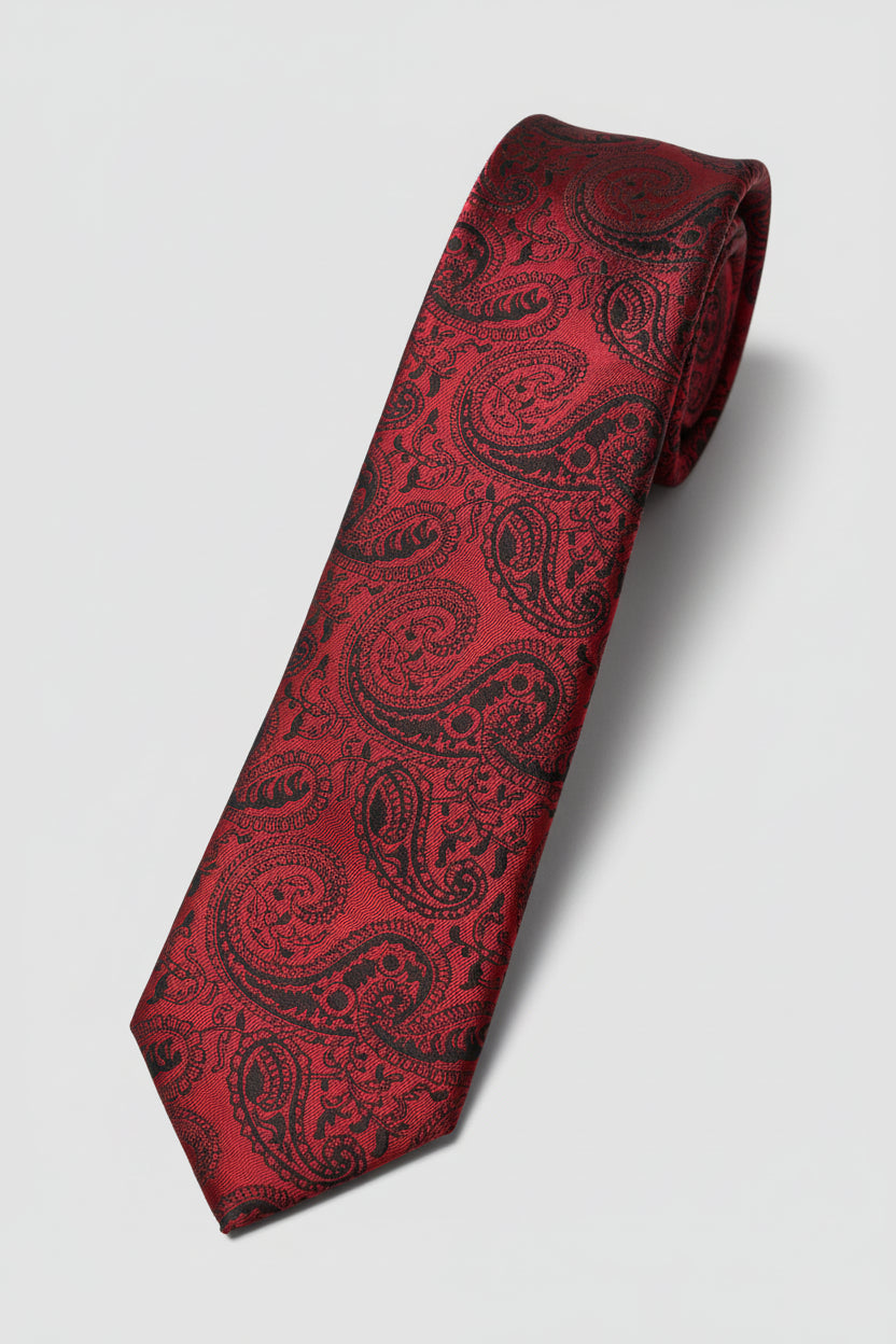 Red paisley silk tie featuring intricate black patterns, ideal for formal occasions.