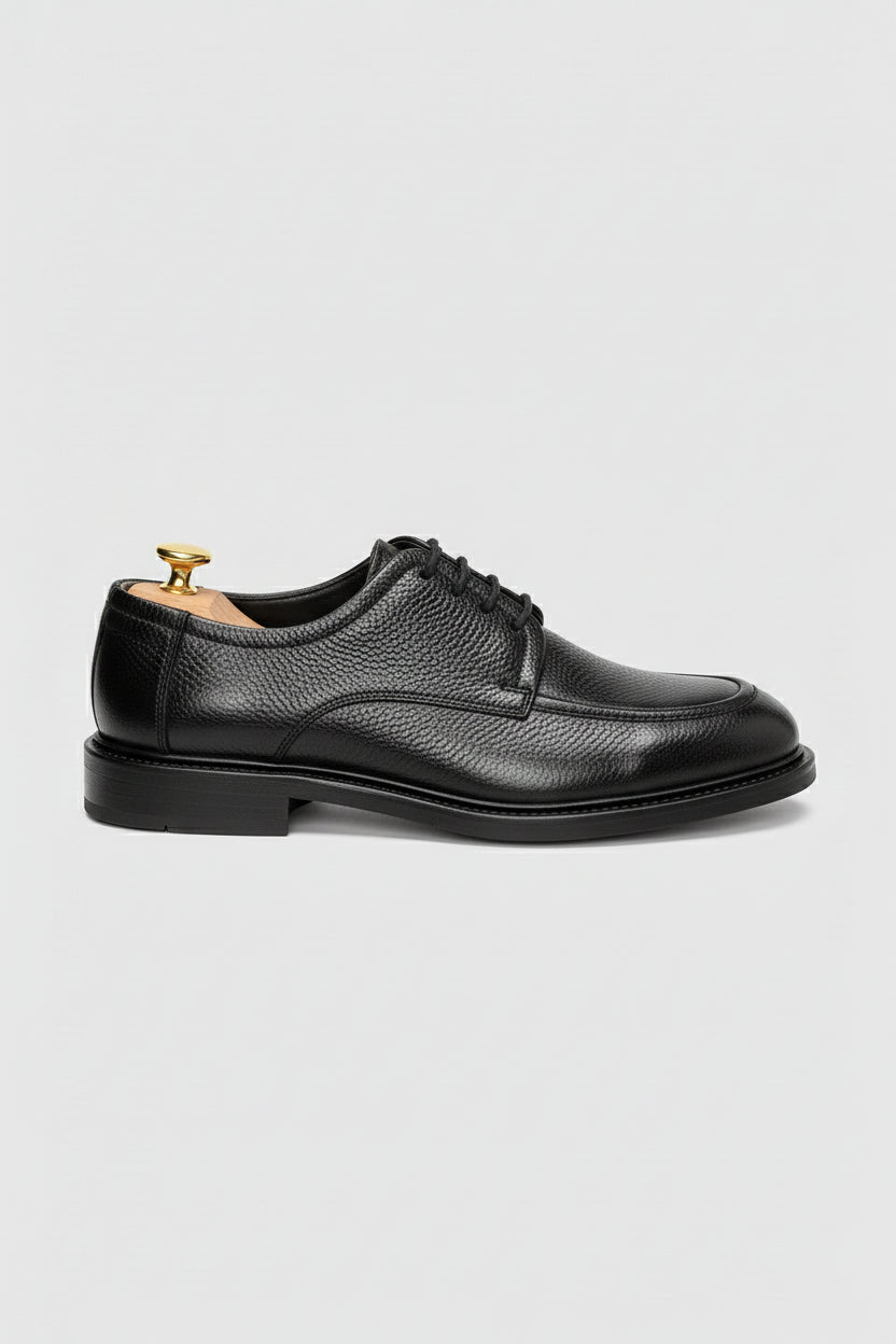 Black leather Oxford shoes with classic design, perfect for formal wear and weddings.