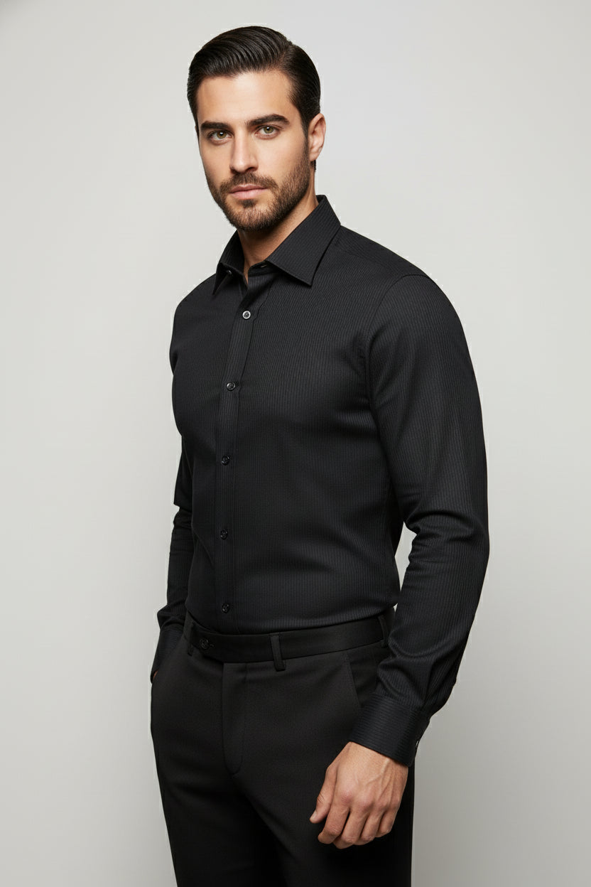 Man wearing black striped slim fit dress shirt, perfect for upscale events.