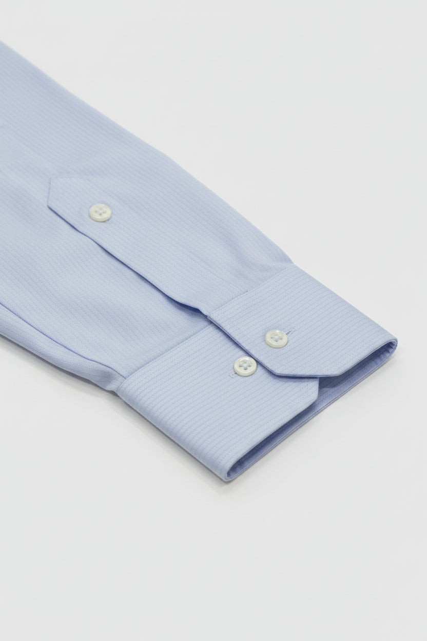 Light blue striped slim fit dress shirt with tailored fit and textured fabric.
