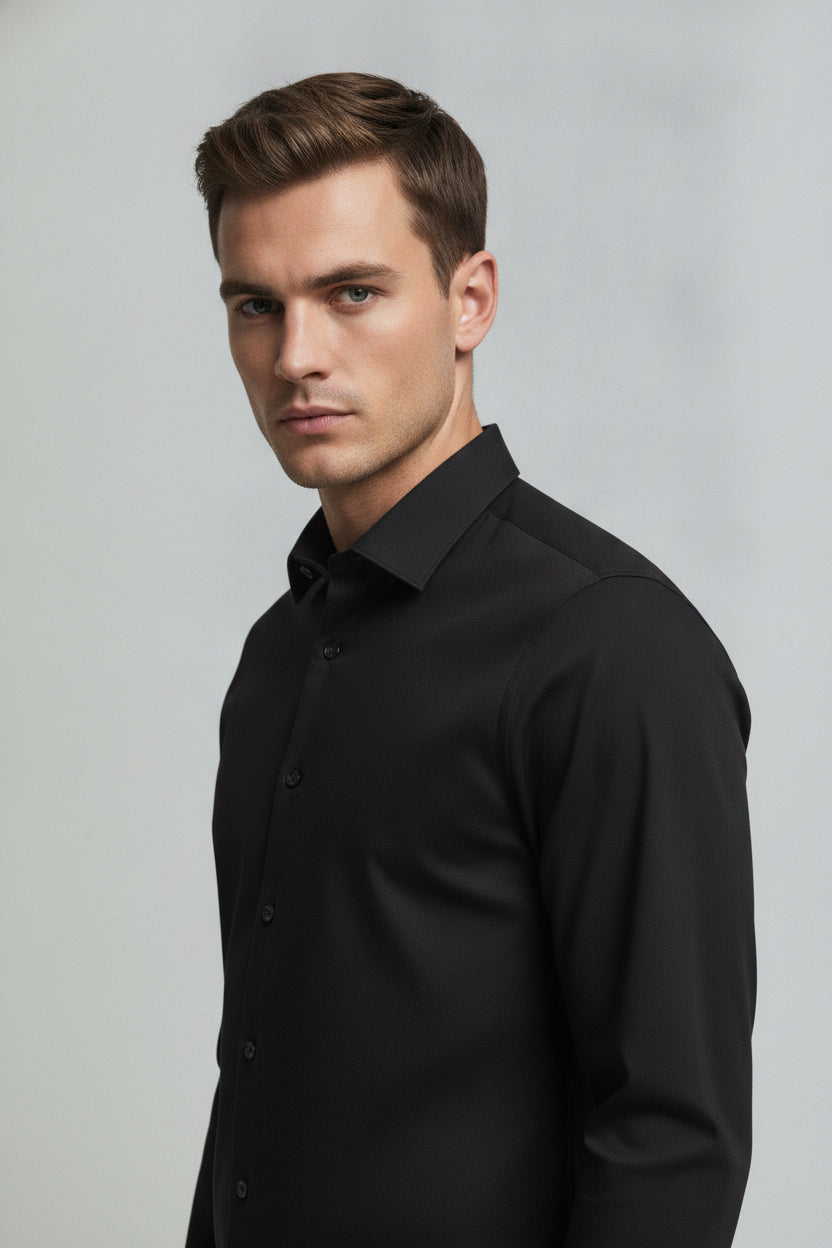 Man wearing jet black tailored formal shirt - Suit Sartoria UAE