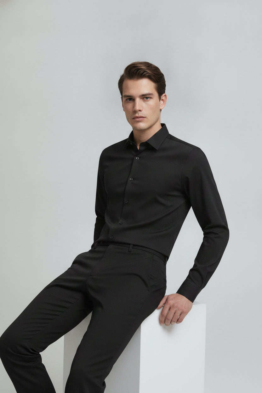 Man wearing jet black formal tailored fit shirt - Suit Sartoria UAE