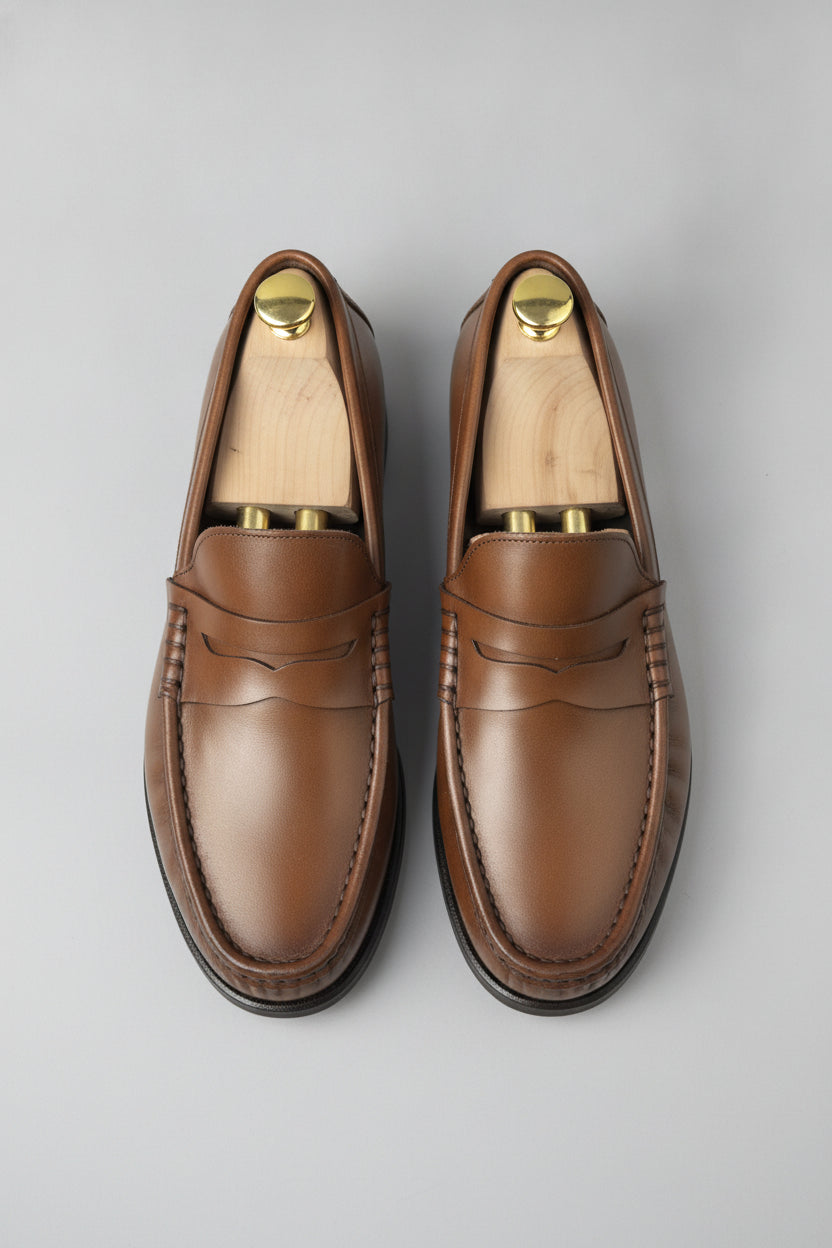 Chestnut brown penny loafers, leather finish - Suit Sartoria UAE