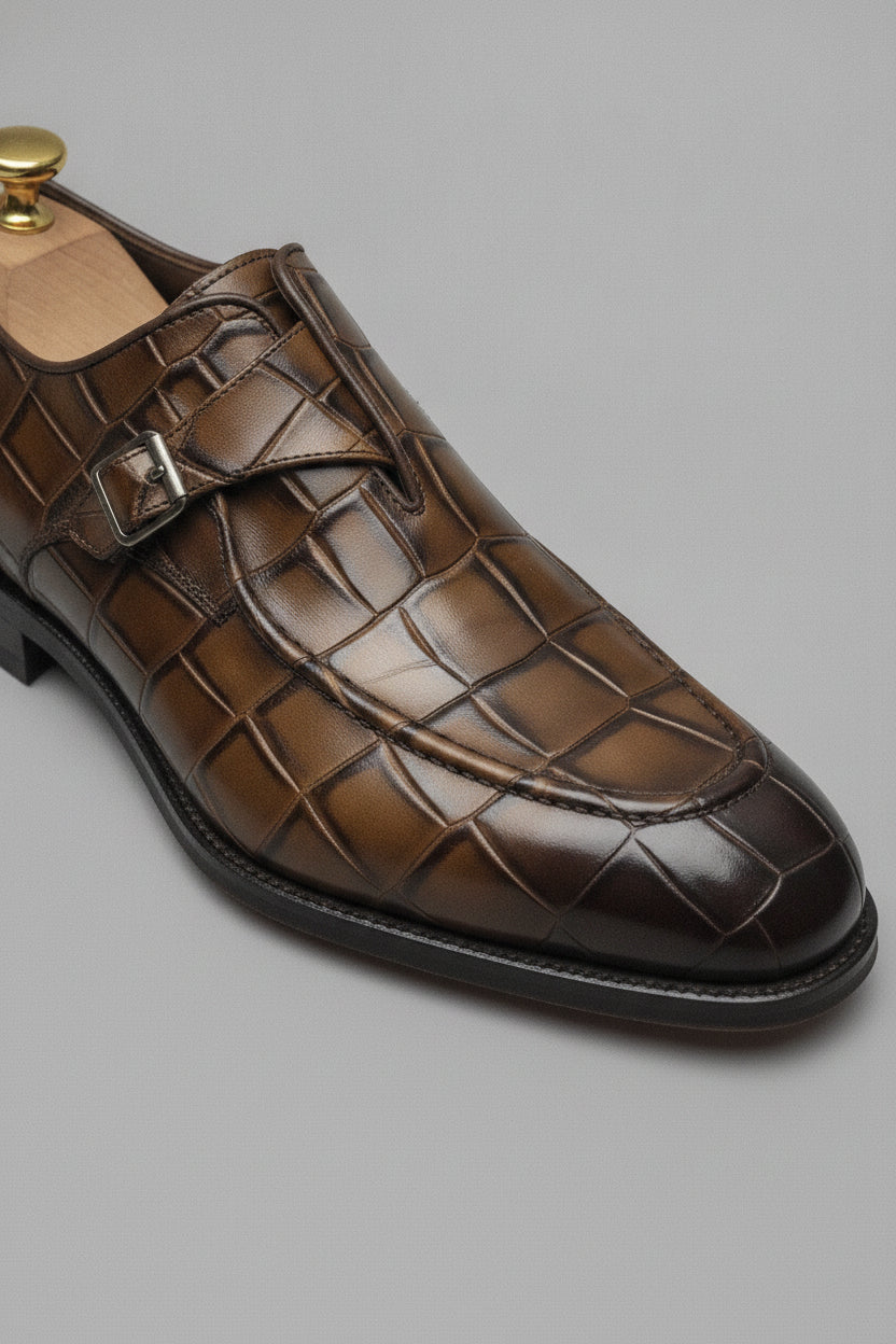 Man wearing cognac brown crocodile pattern loafers - Suit Sartoria UAE