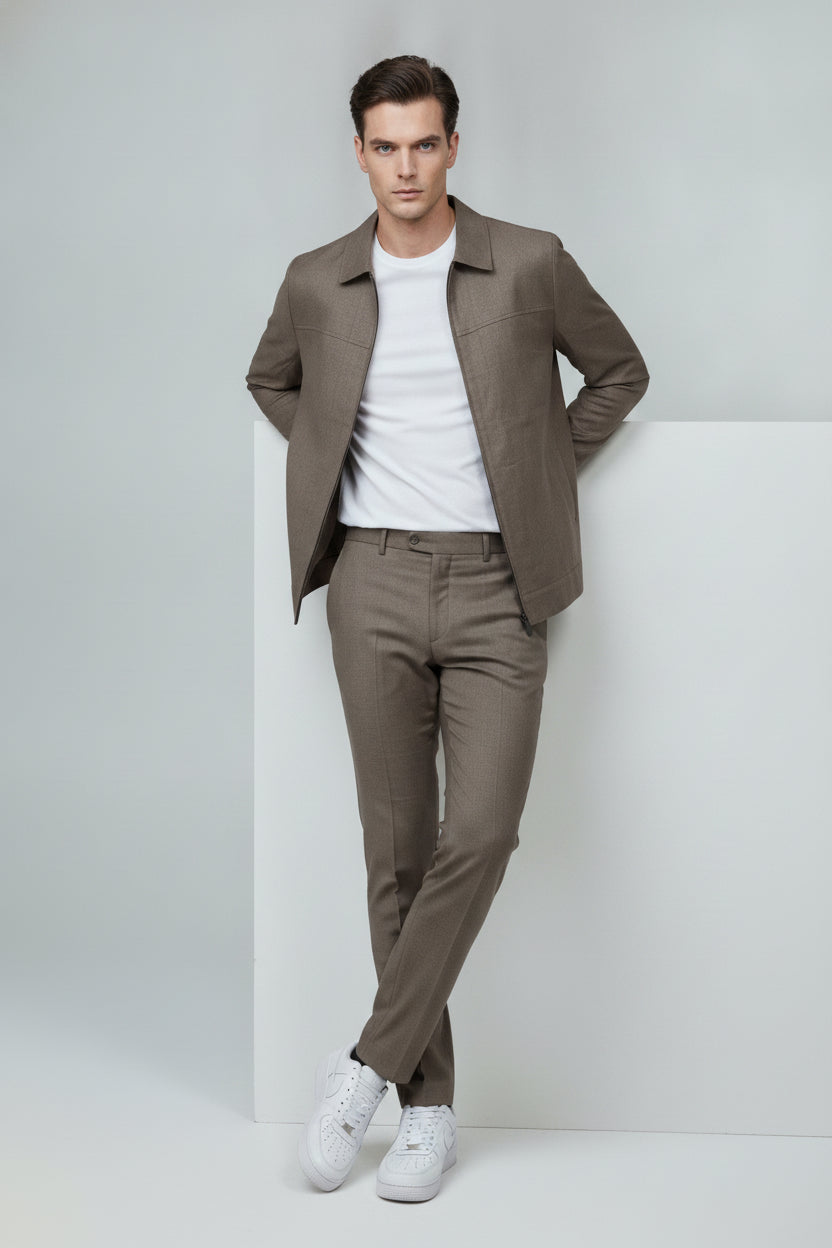 Man wearing taupe zip-front safari suit with classic collar - Suit Sartoria UAE