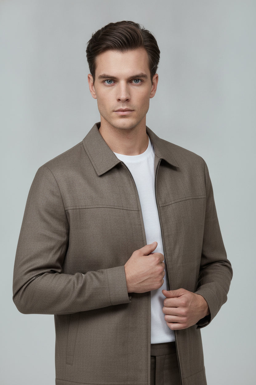 Man wearing taupe zip-front safari suit - Suit Sartoria UAE