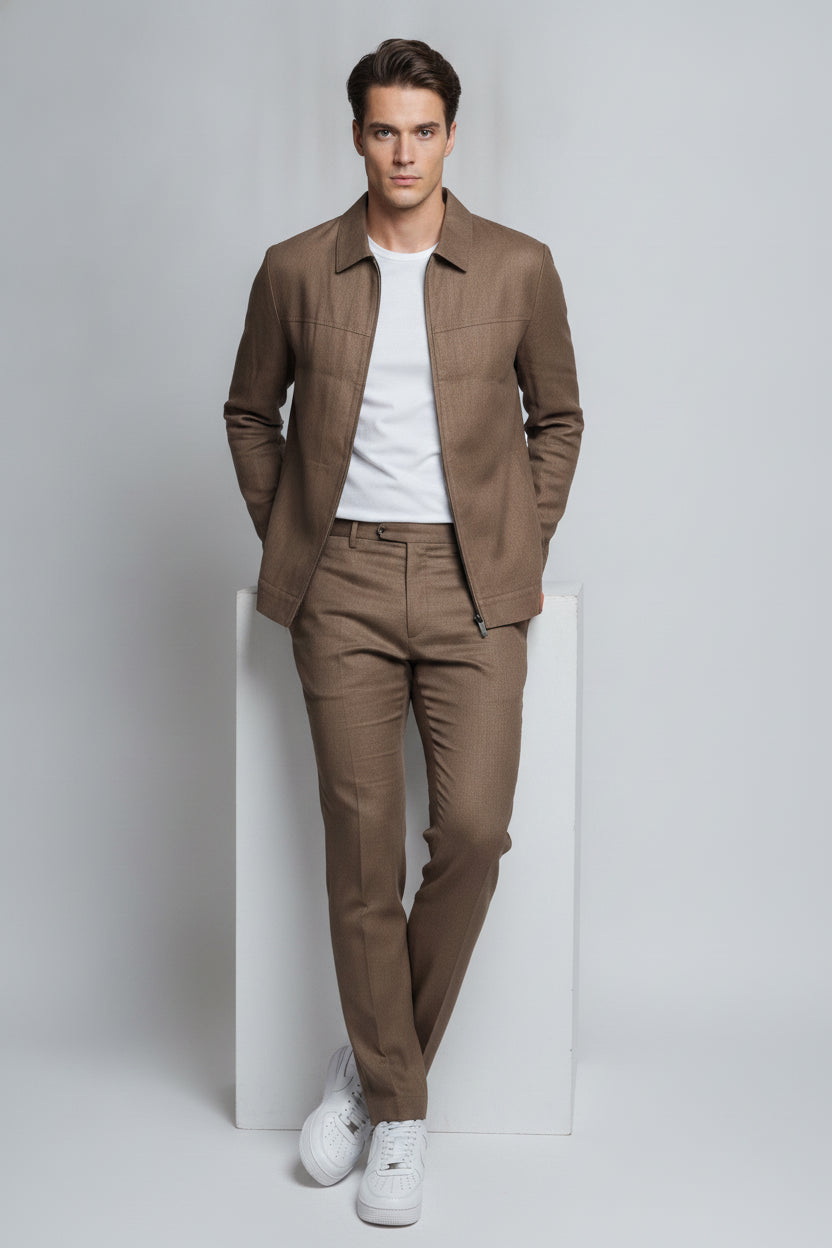 Man wearing chocolate brown safari suit with zipper front - Suit Sartoria UAE