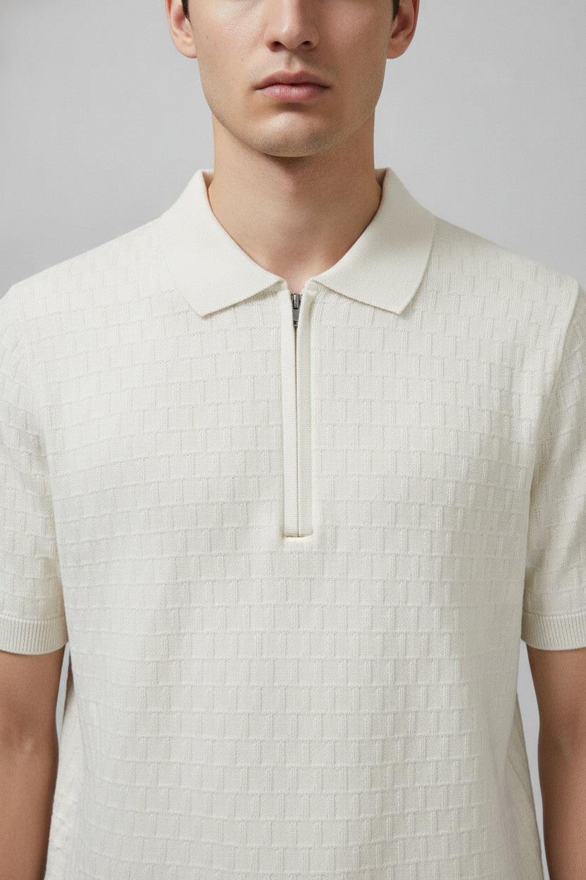 Man wearing off-white zip collar t-shirt - Suit Sartoria UAE
